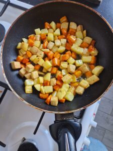 Stir-fried potatoes,carrot and tofu