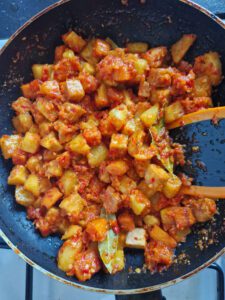 stir potatoes, carrot and tofu