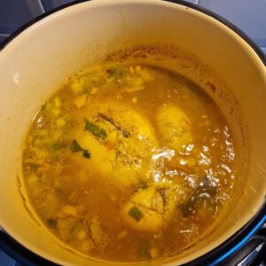 Boiling chicken soup