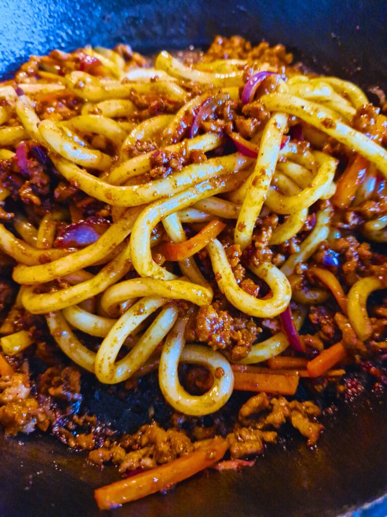 Chewy noodles, savory sauce, total bliss