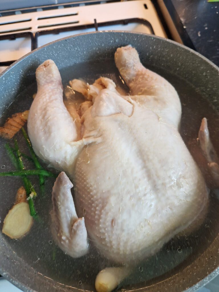 Chicken put in boiling water