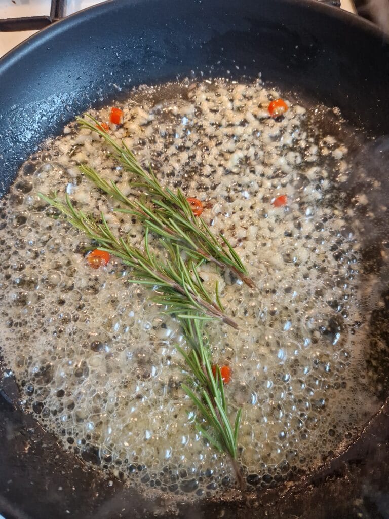 Butter, garlic, chili and Rosmery