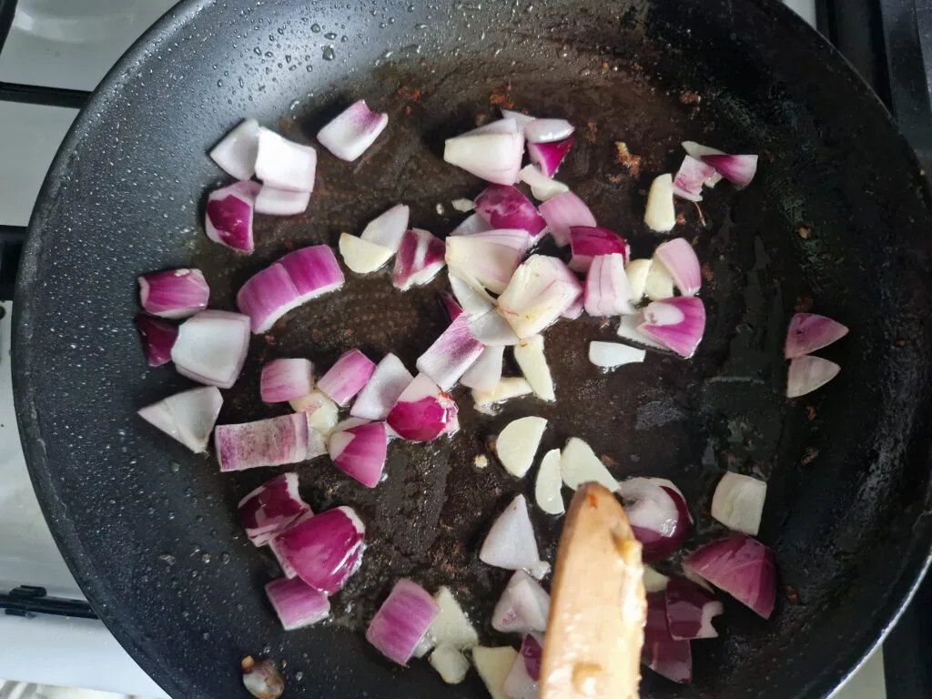 Black Pepper Chicken (Simple, Spicy, Satisfying!) 6 Add onion, garlic and bell peppers